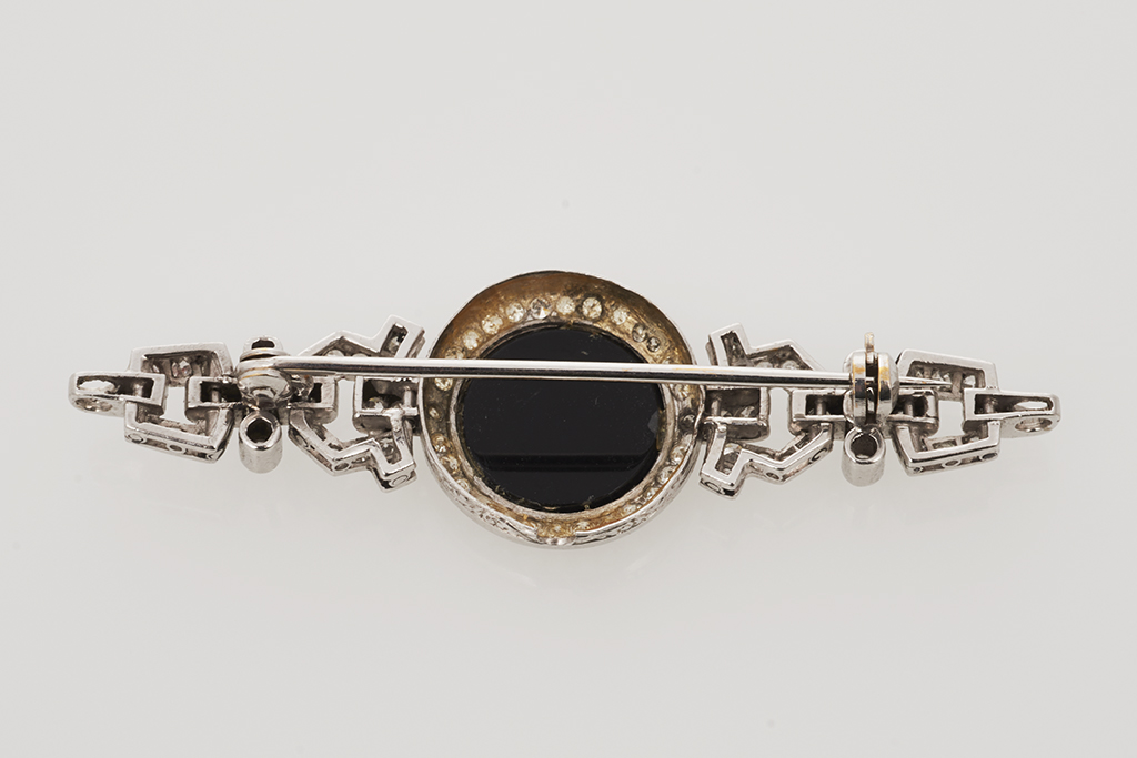 Art Deco Black Onyx and Diamond Brooch - Shapiro Auctioneers