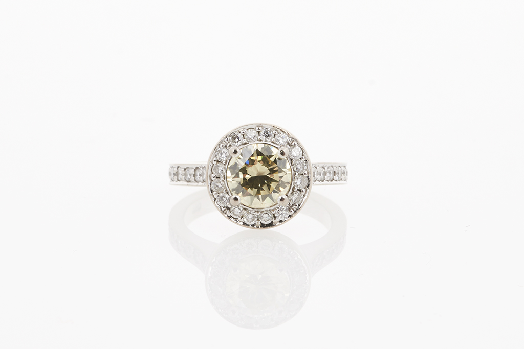 White Gold and Yellow Diamond Ring - Shapiro Auctioneers